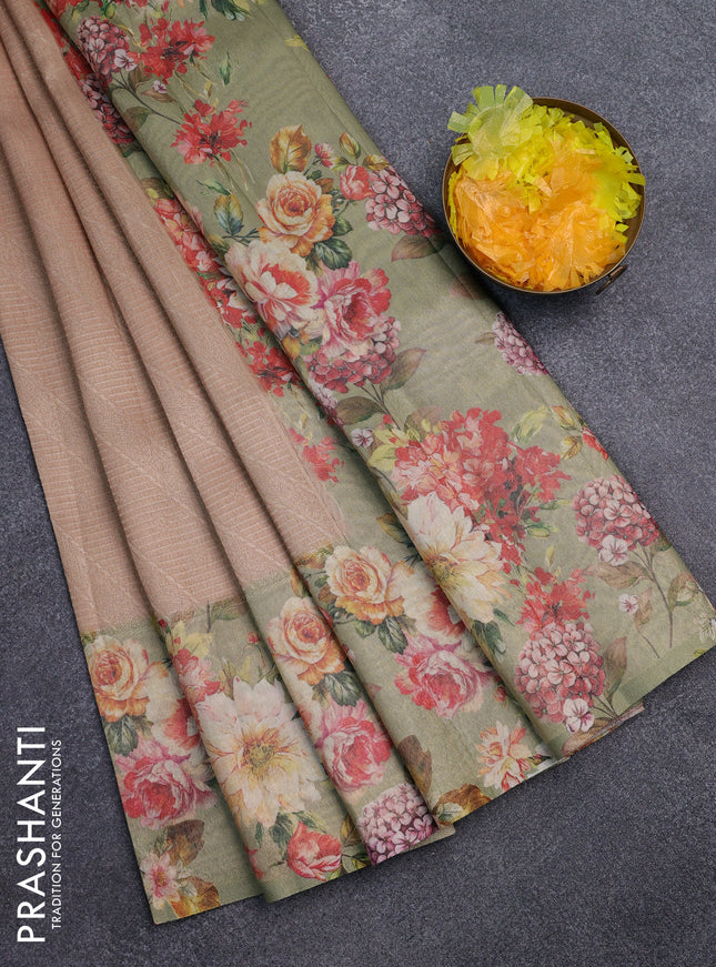 Tissue saree sandal and pastel green with allover zari weaves and floral digital printed border
