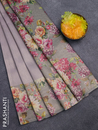 Tissue saree pastel lavender and grey shade with allover zari weaves and floral digital printed border