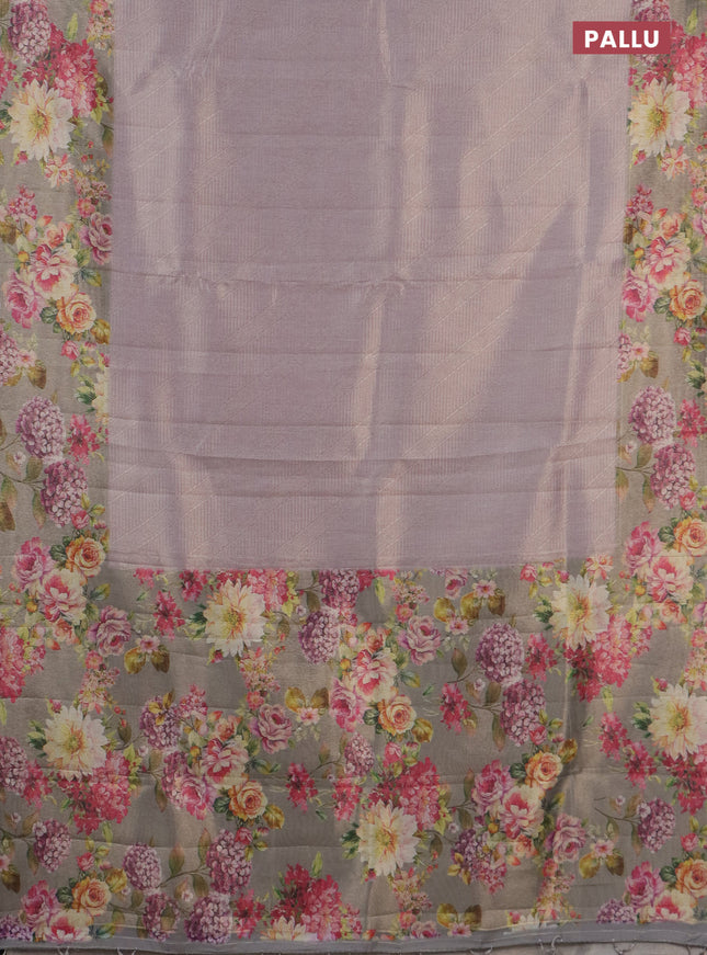 Tissue saree pastel lavender and grey shade with allover zari weaves and floral digital printed border