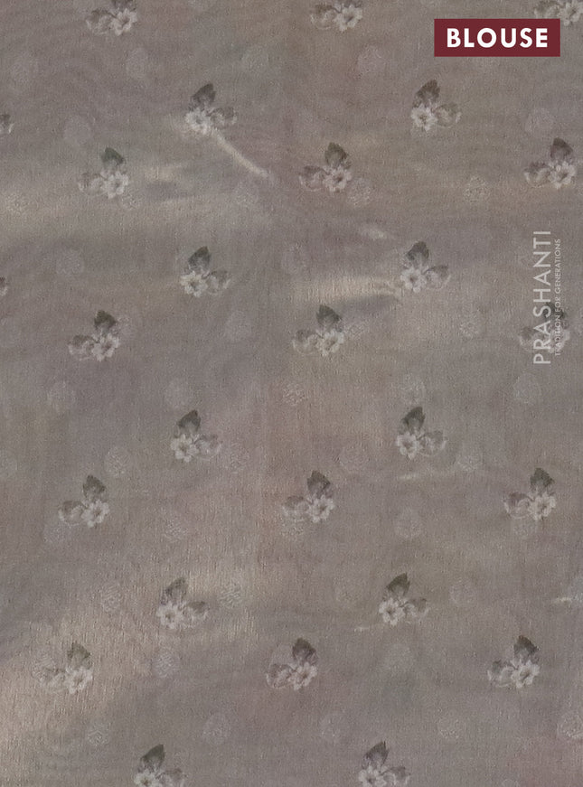 Tissue saree pastel lavender and grey shade with allover zari weaves and floral digital printed border