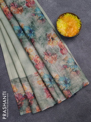 Tissue saree pastel green and grey with allover zari weaves and floral digital printed border
