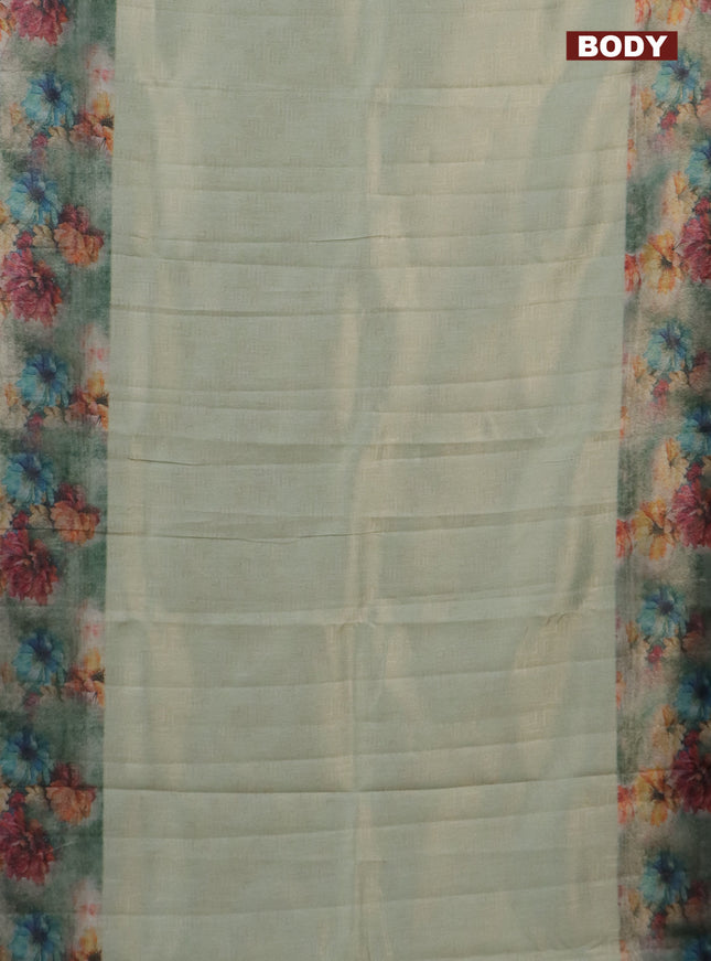 Tissue saree pastel green and grey with allover zari weaves and floral digital printed border
