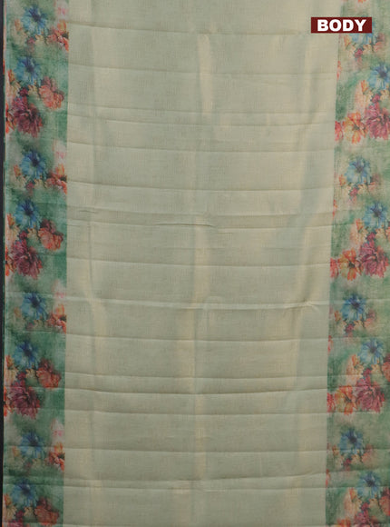 Tissue saree teal shade and teal green with allover zari weaves and floral digital printed border