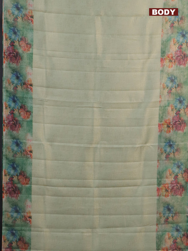 Tissue saree teal shade and teal green with allover zari weaves and floral digital printed border