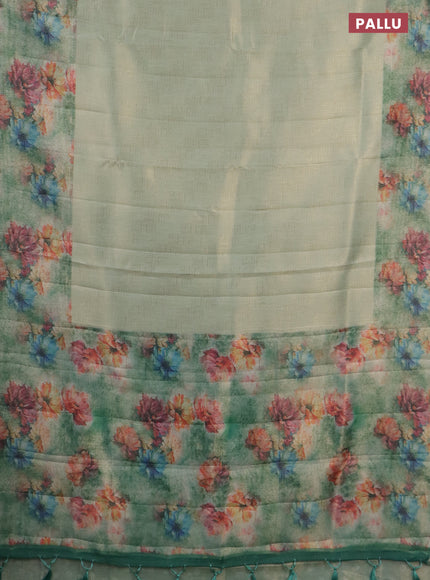 Tissue saree teal shade and teal green with allover zari weaves and floral digital printed border