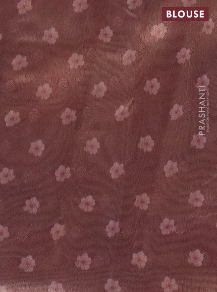 Tissue saree sandal and pastel brown with allover zari weaves and floral digital printed border