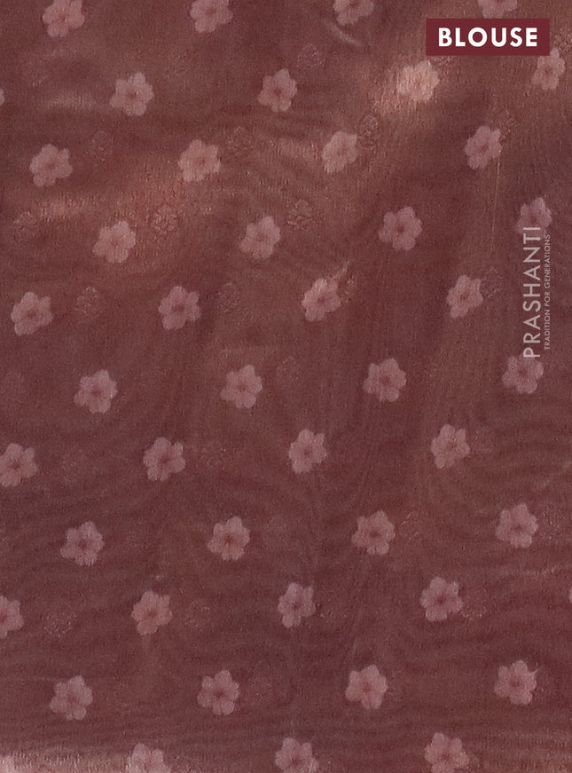 Tissue saree sandal and pastel brown with allover zari weaves and floral digital printed border