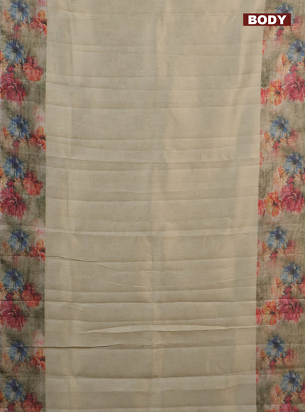 Tissue saree cream and pastel green with allover zari weaves and floral digital printed border