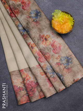 Tissue saree cream and sandal with allover zari weaves and floral digital printed border