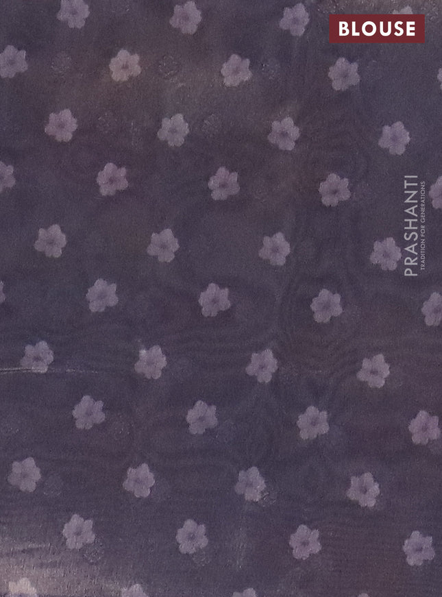 Tissue saree beige and grey shade with allover zari weaves and floral digital printed border