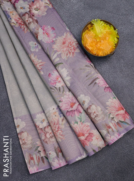 Tissue saree grey shade and lavender with allover zari weaves and floral digital printed border
