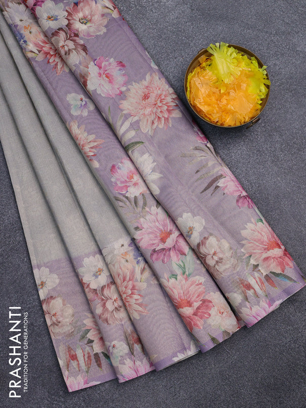Tissue saree grey shade and lavender with allover zari weaves and floral digital printed border