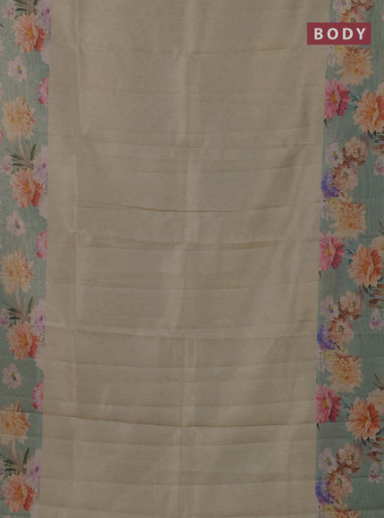 Tissue saree pista green shade and pastel green with allover zari weaves and floral digital printed border