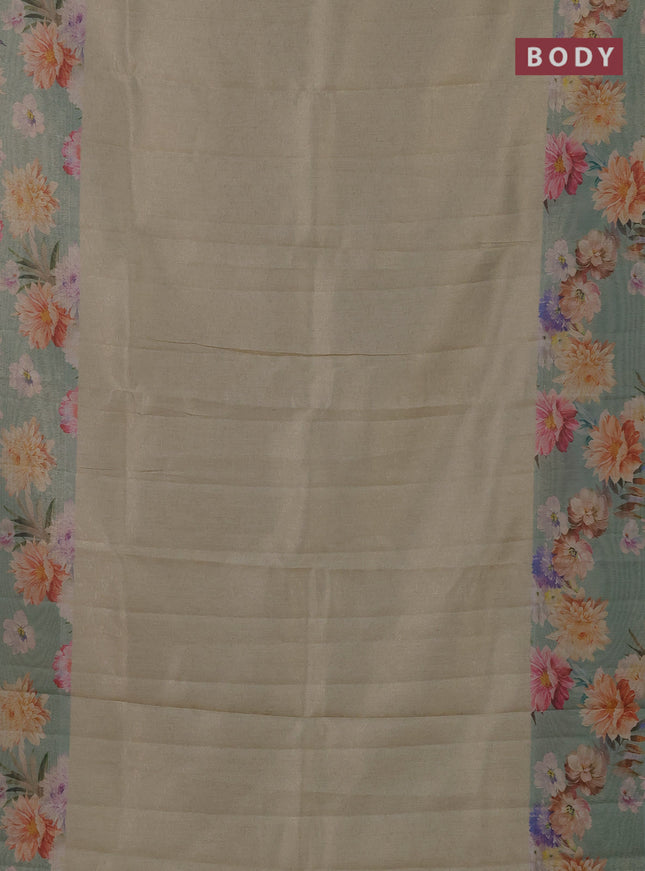 Tissue saree pista green shade and pastel green with allover zari weaves and floral digital printed border