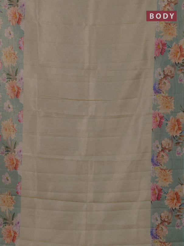 Tissue saree pista green shade and pastel green with allover zari weaves and floral digital printed border