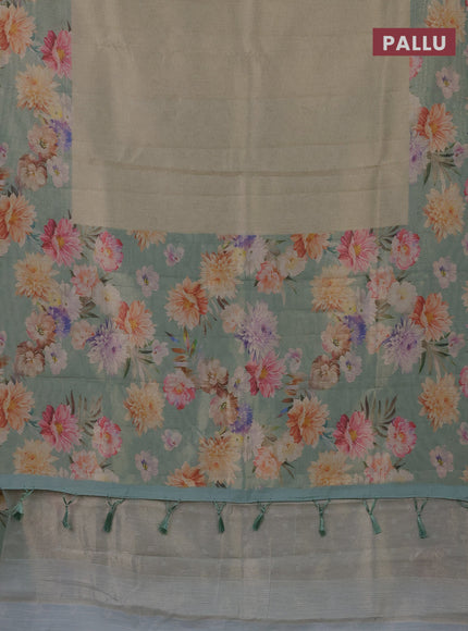 Tissue saree pista green shade and pastel green with allover zari weaves and floral digital printed border