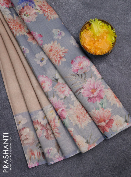 Tissue saree sandal and pastel blue with allover zari weaves and floral digital printed border