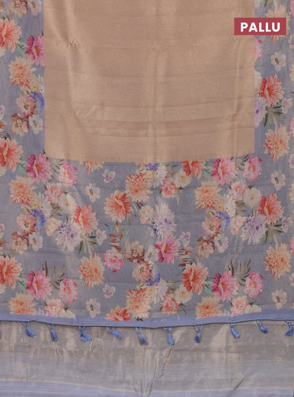 Tissue saree sandal and pastel blue with allover zari weaves and floral digital printed border