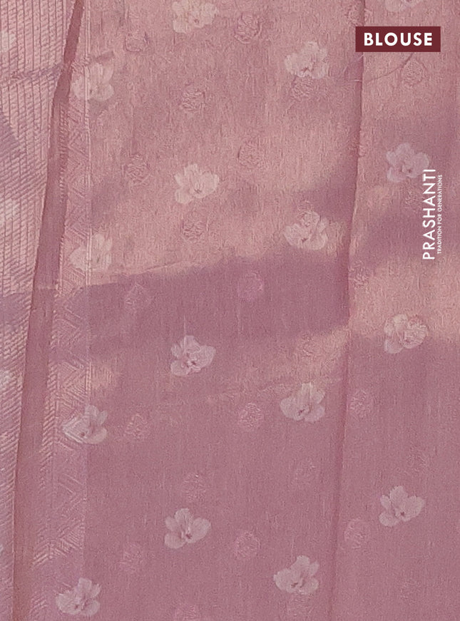 Tissue saree teal shade and pink with allover zari weaves and floral digital printed border