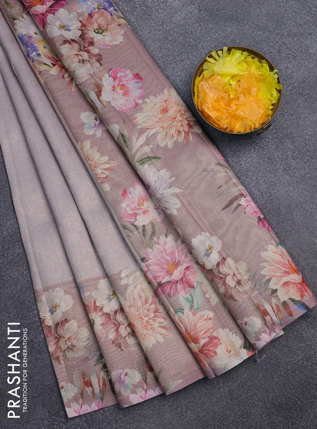 Tissue saree pastel lavender and pastel pink with allover zari weaves and floral digital printed border