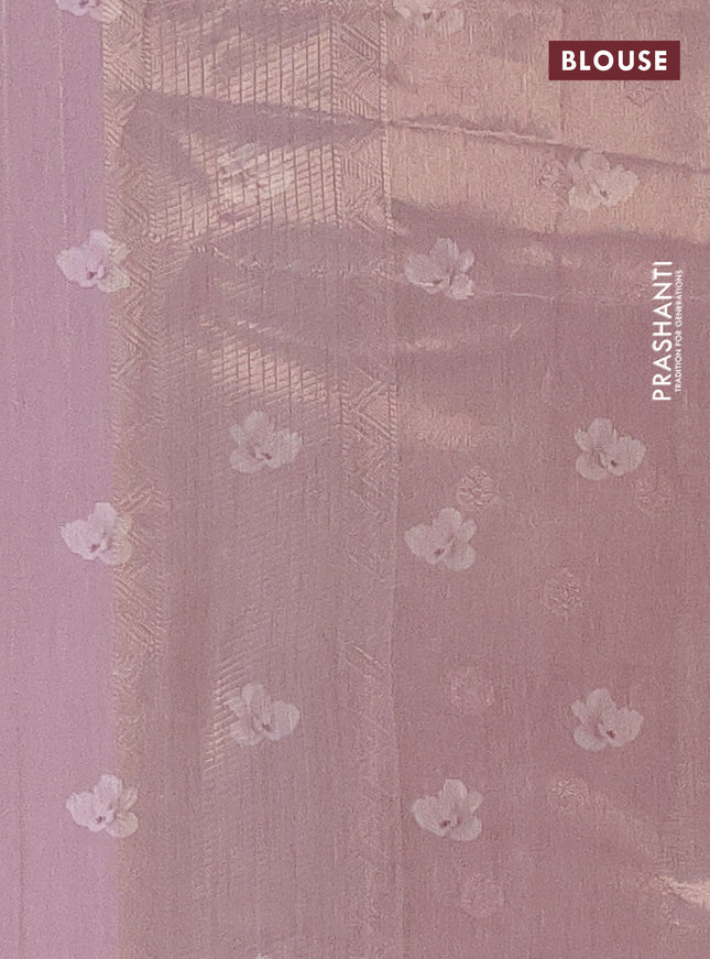 Tissue saree pastel lavender and pastel pink with allover zari weaves and floral digital printed border
