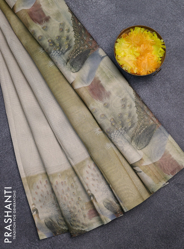 Tissue saree beige with allover zari weaves and digital printed border