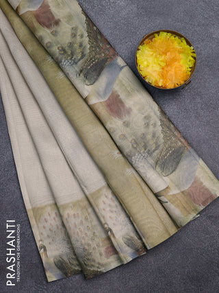 Tissue saree beige with allover zari weaves and digital printed border
