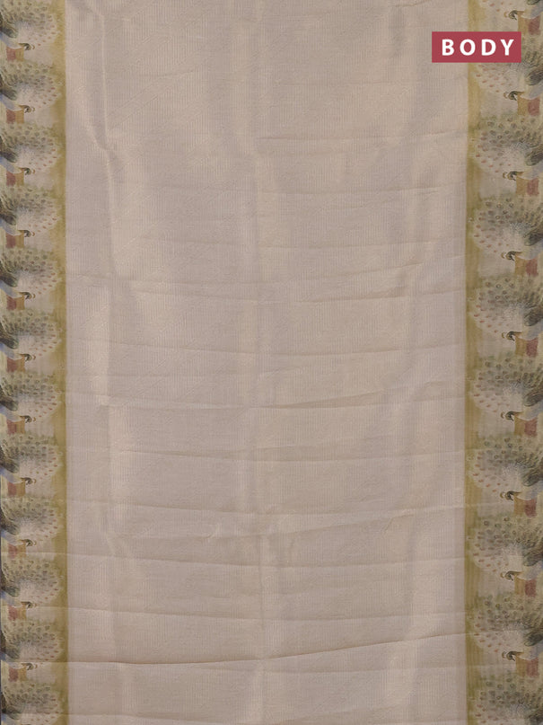 Tissue saree beige with allover zari weaves and digital printed border