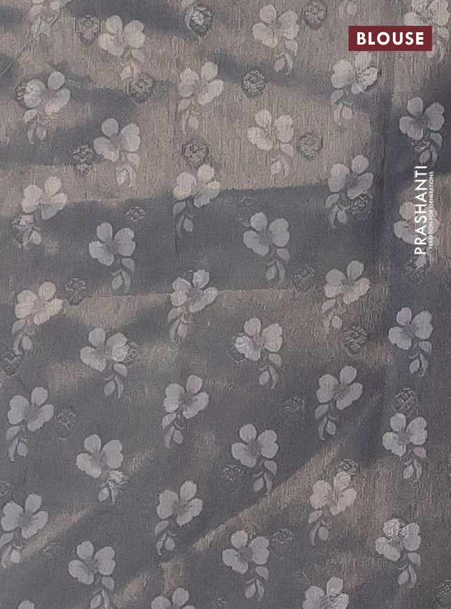 Tissue saree pastel grey with allover zari weaves and digital printed border