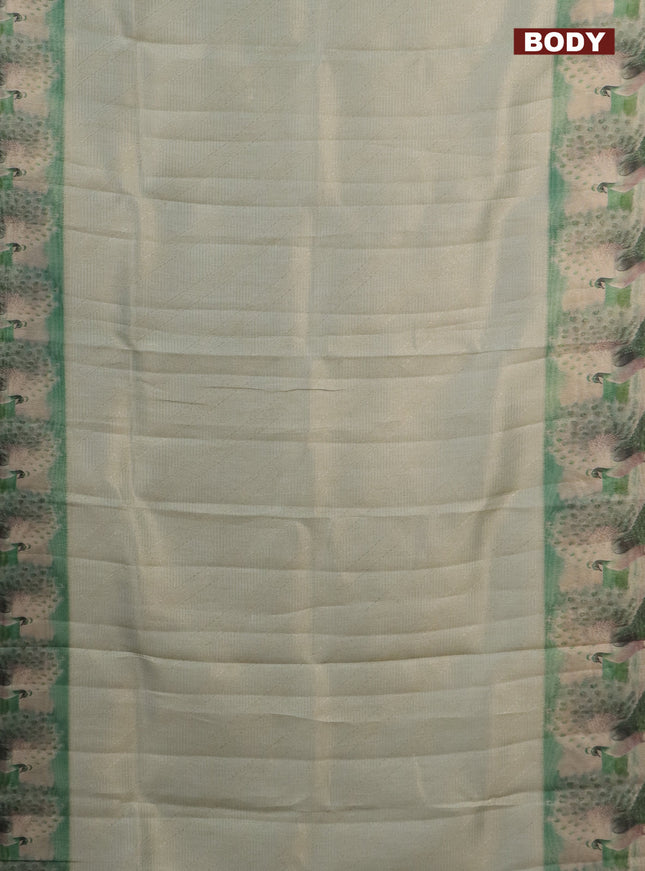 Tissue saree mild pista green with allover zari weaves and digital printed border
