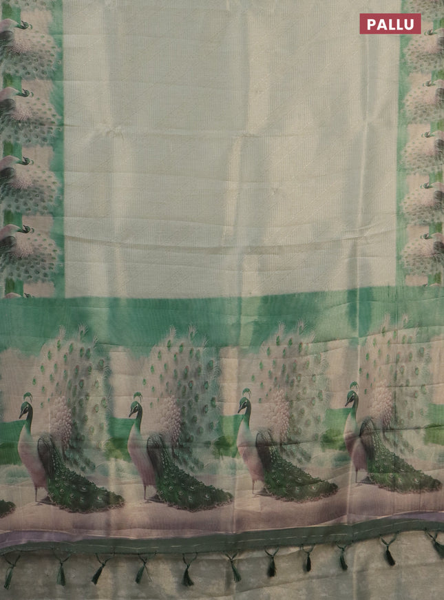 Tissue saree mild pista green with allover zari weaves and digital printed border