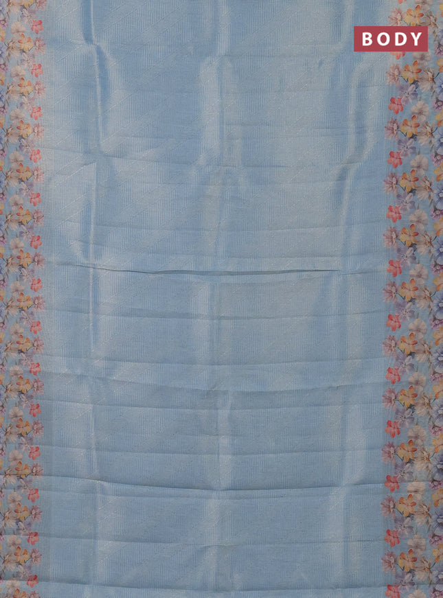 Tissue saree light blue with allover zari weaves and floral digital printed border