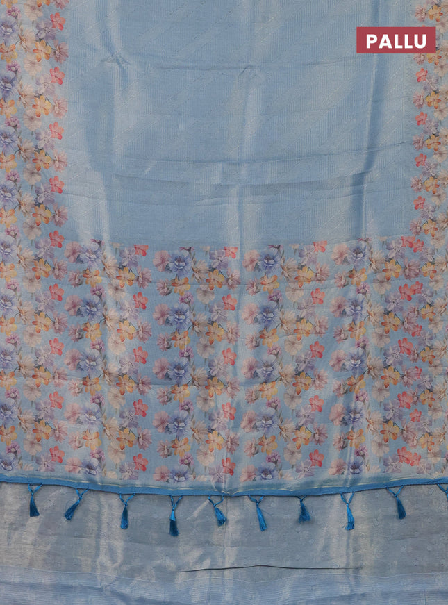 Tissue saree light blue with allover zari weaves and floral digital printed border