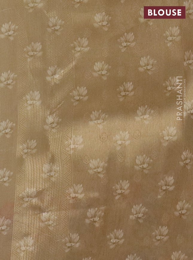 Tissue saree gold with allover zari weaves and floral digital printed border