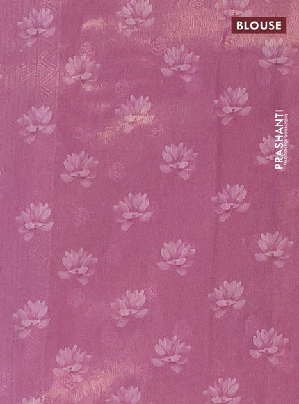Tissue saree light pink with allover zari weaves and floral digital printed border