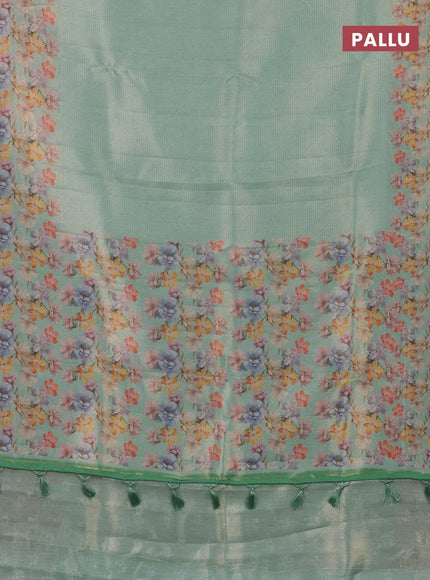 Tissue saree teal green shade with allover zari weaves and floral digital printed border