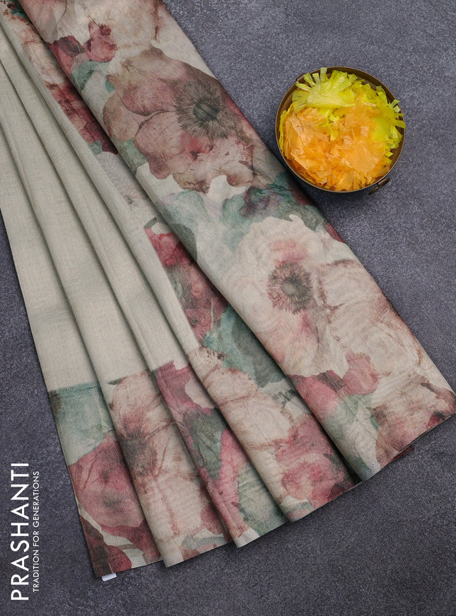 Tissue saree beige with allover zari weaves and floral digital printed border