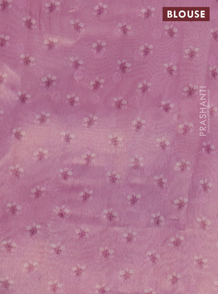 Tissue saree light pink with allover zari weaves and floral digital printed border