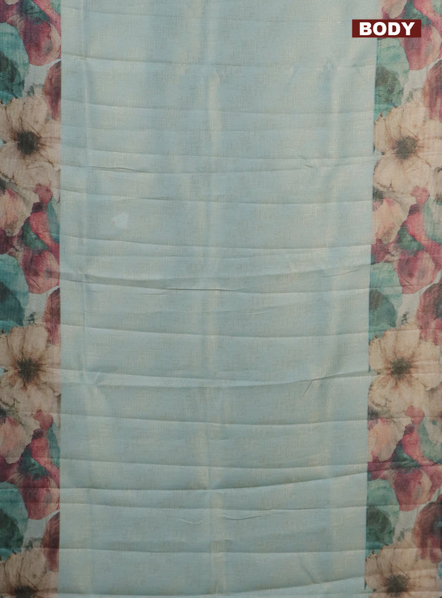 Tissue saree teal blue with allover zari weaves and floral digital printed border