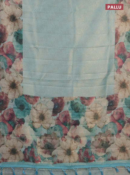 Tissue saree teal blue with allover zari weaves and floral digital printed border