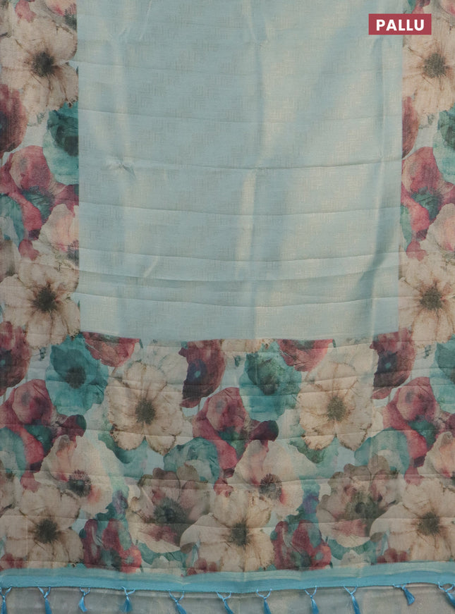 Tissue saree teal blue with allover zari weaves and floral digital printed border