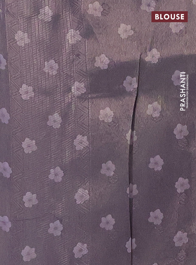 Tissue saree beige and violet with allover zari weaves and floral digital printed border