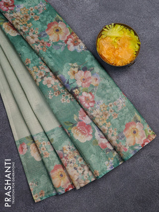 Tissue saree pastel green and green with allover zari weaves and floral digital printed border