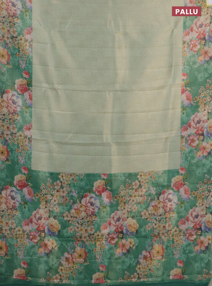 Tissue saree pastel green and green with allover zari weaves and floral digital printed border