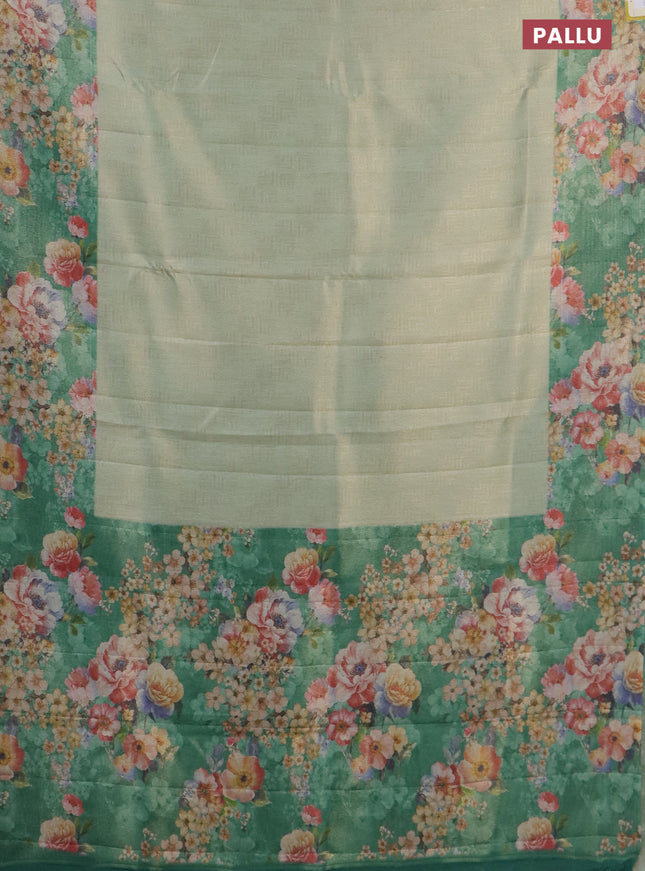 Tissue saree pastel green and green with allover zari weaves and floral digital printed border
