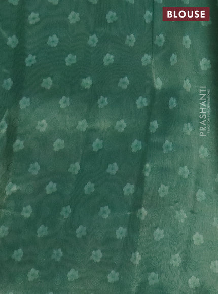 Tissue saree pastel green and green with allover zari weaves and floral digital printed border