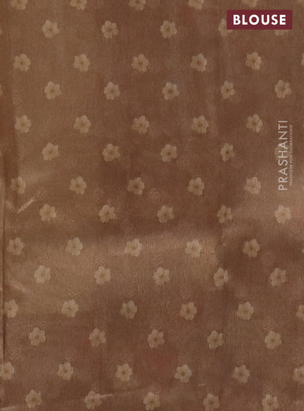 Tissue saree sandal and brown with allover zari weaves and floral digital printed border