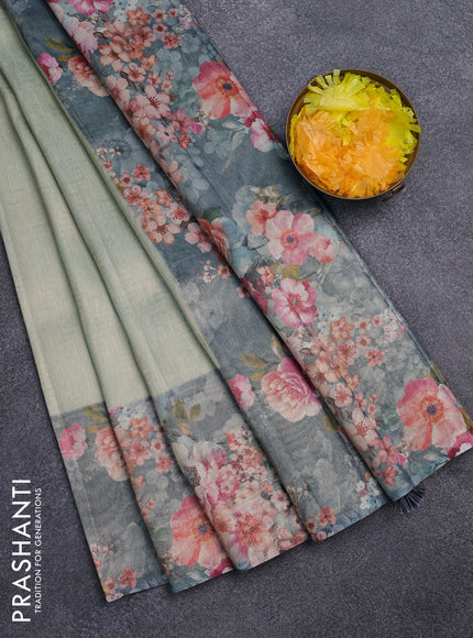 Tissue saree pista green and grey with allover zari weaves and floral digital printed border
