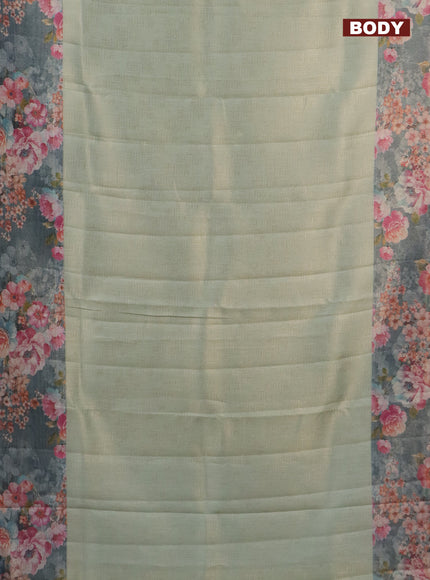 Tissue saree pista green and grey with allover zari weaves and floral digital printed border