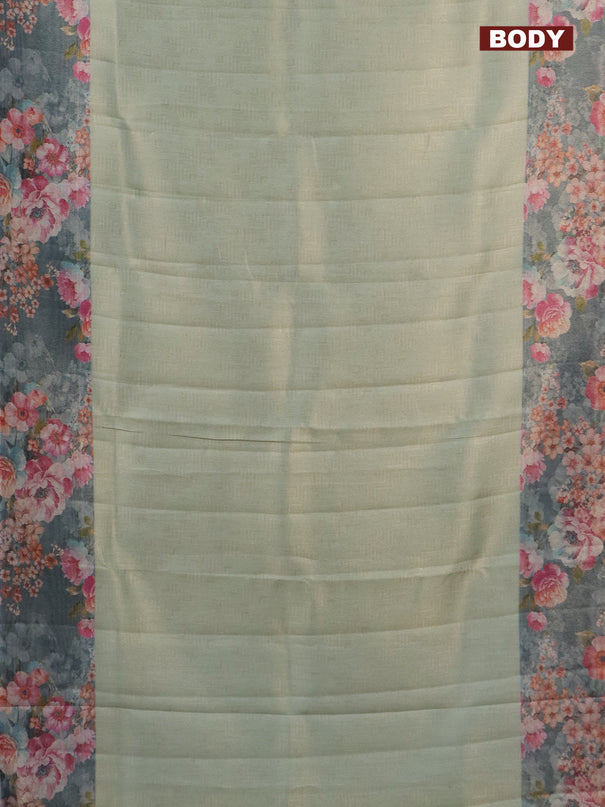 Tissue saree pista green and grey with allover zari weaves and floral digital printed border